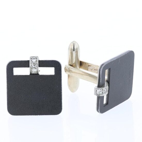 G.T. Marsh steel, white gold and platinum mounted diamonds cuff link set